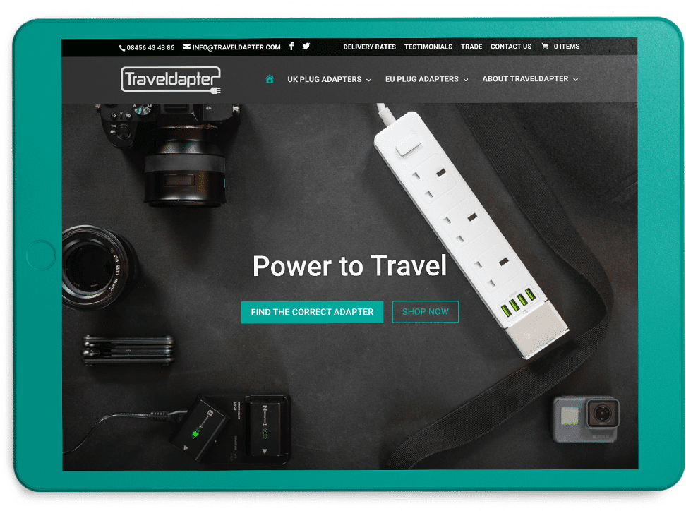Traveldapter website homepage on turquoise ipad mockup