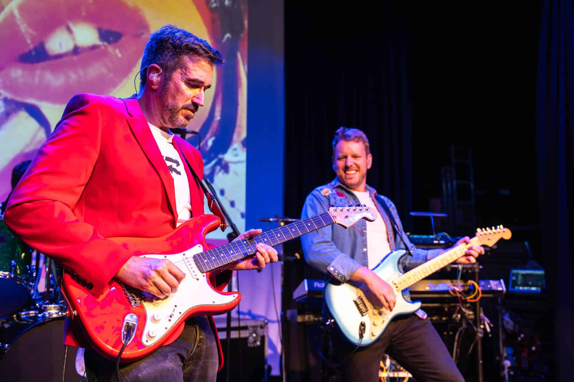 Guitarists on stage