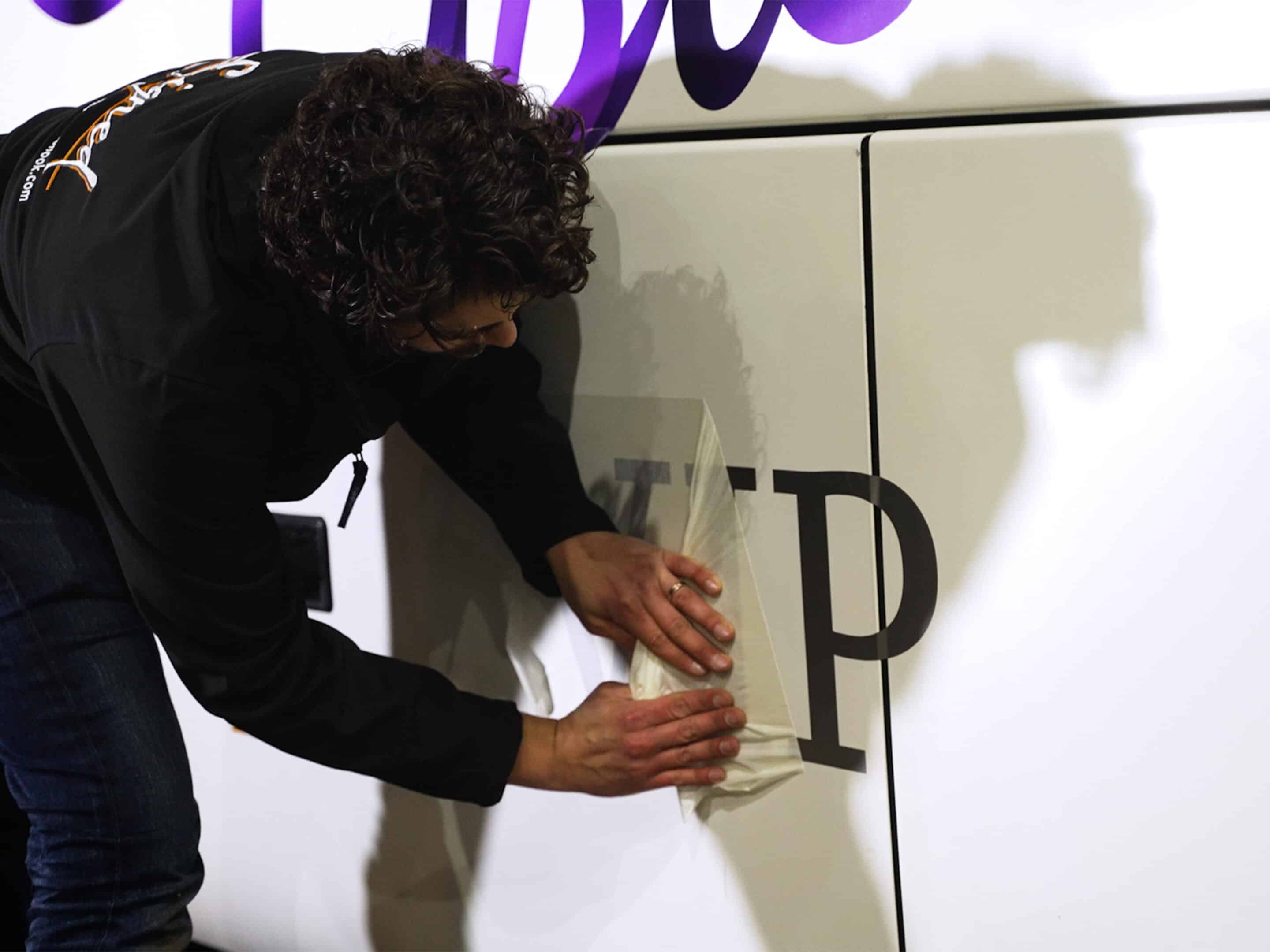 Astons Coaches VIP Coach Vehicle Graphics Being Applied