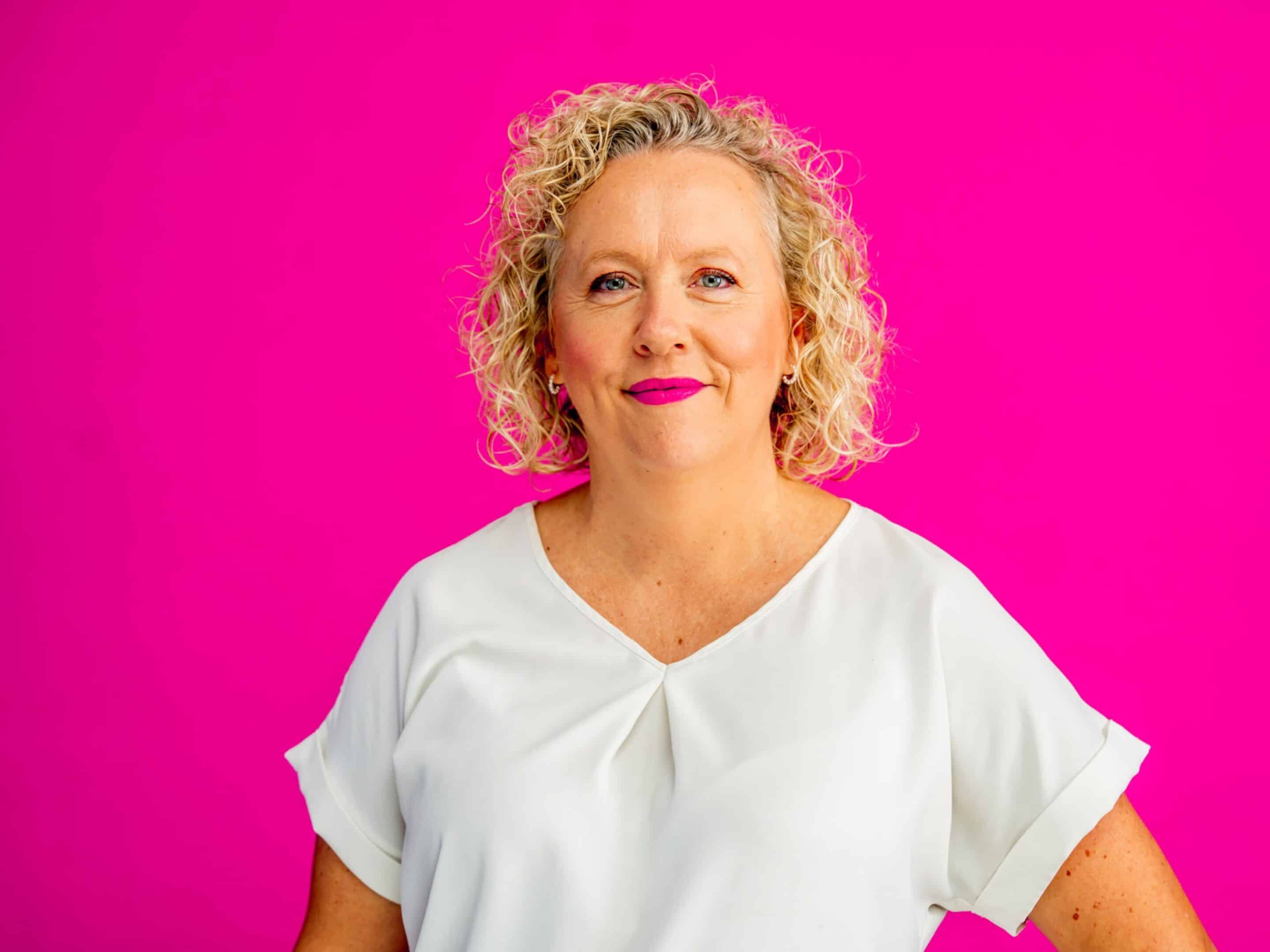 Prime mix headshots on bright pink backdrop